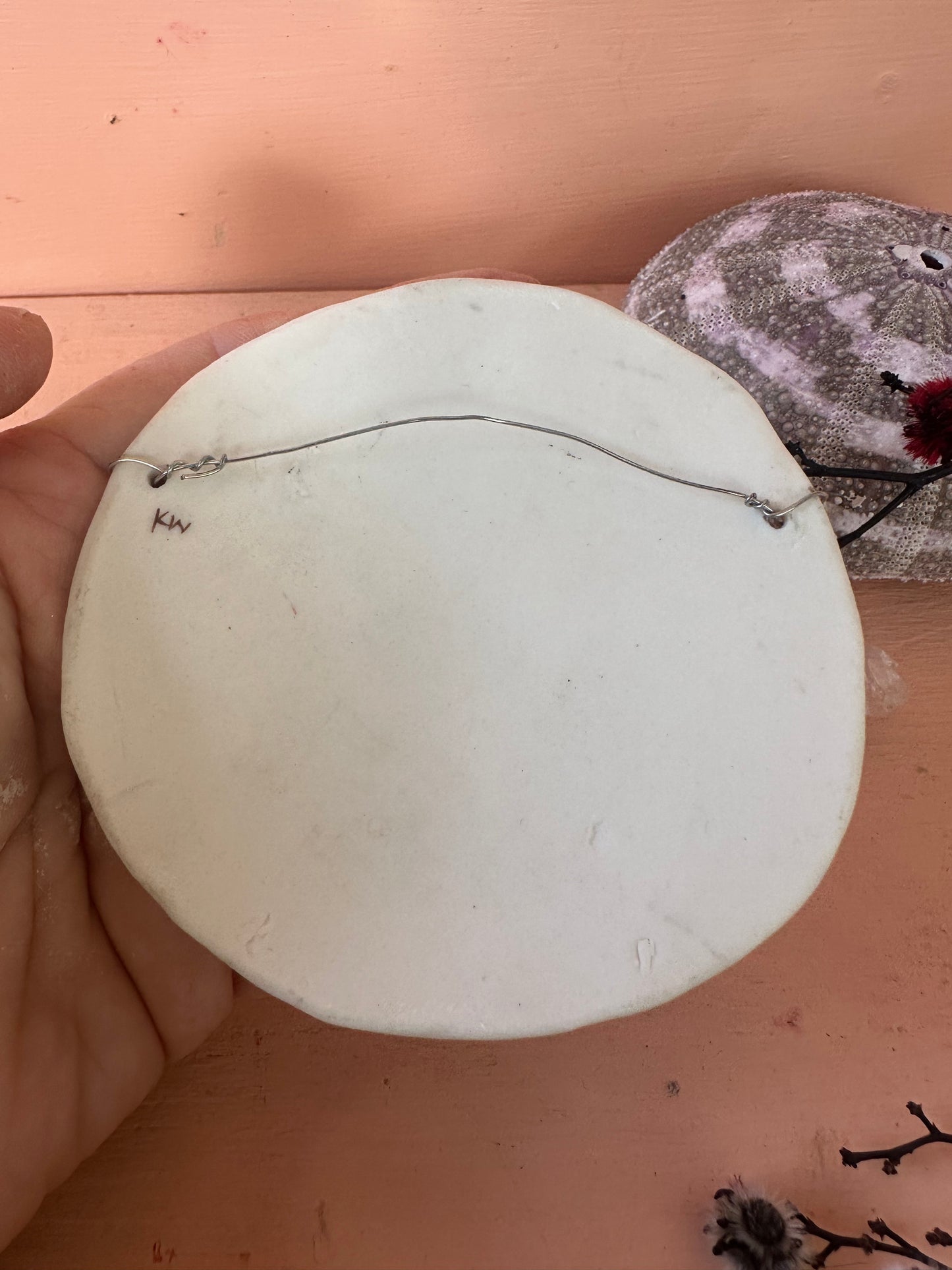 Sepia ‘Feather’ porcelain wall piece, with gold detail