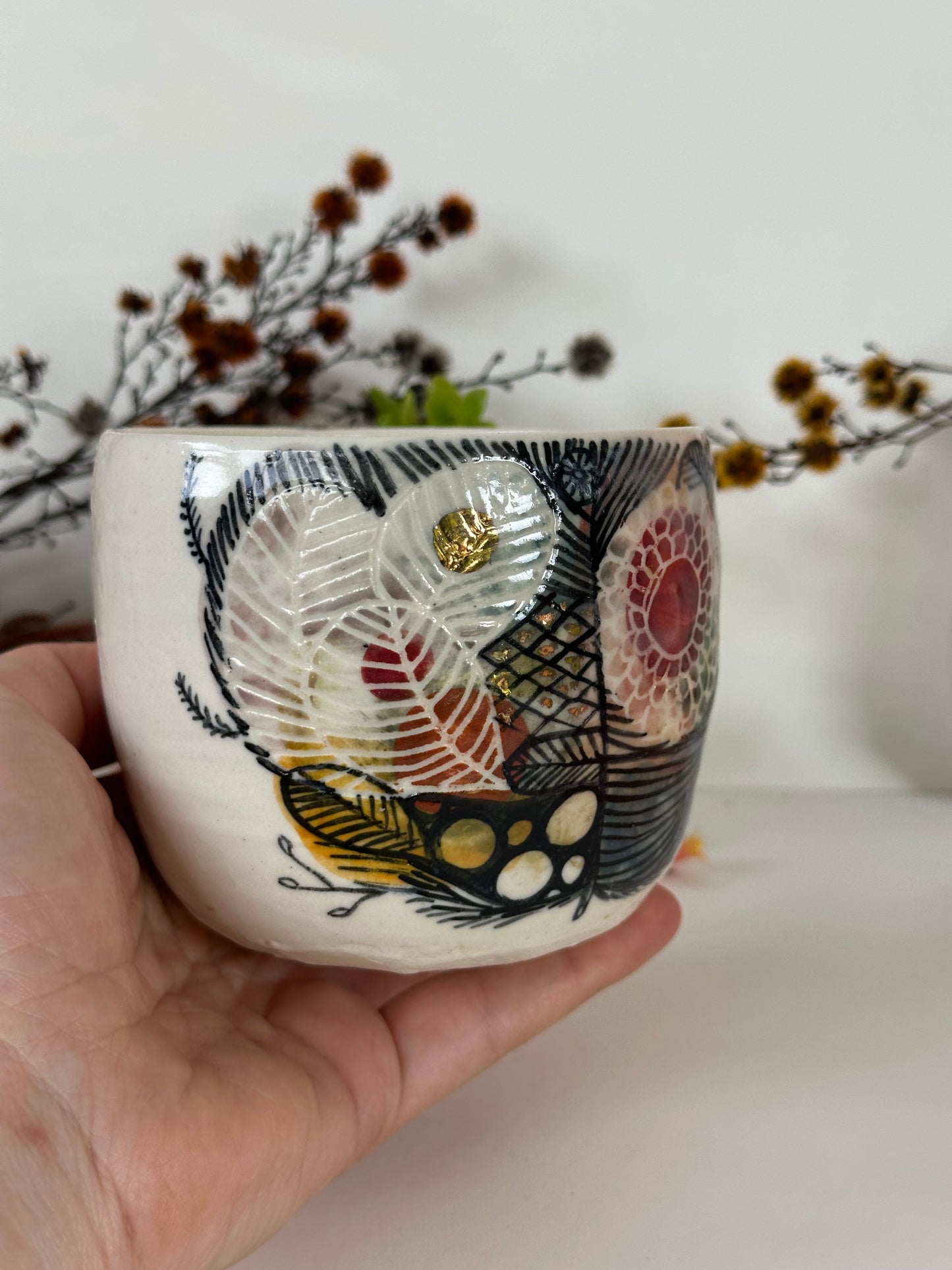 ‘Feather’ hand painted cup