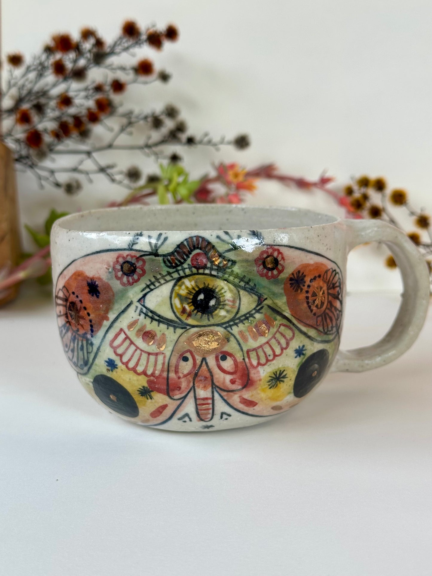 ‘moth’ hand painted cup