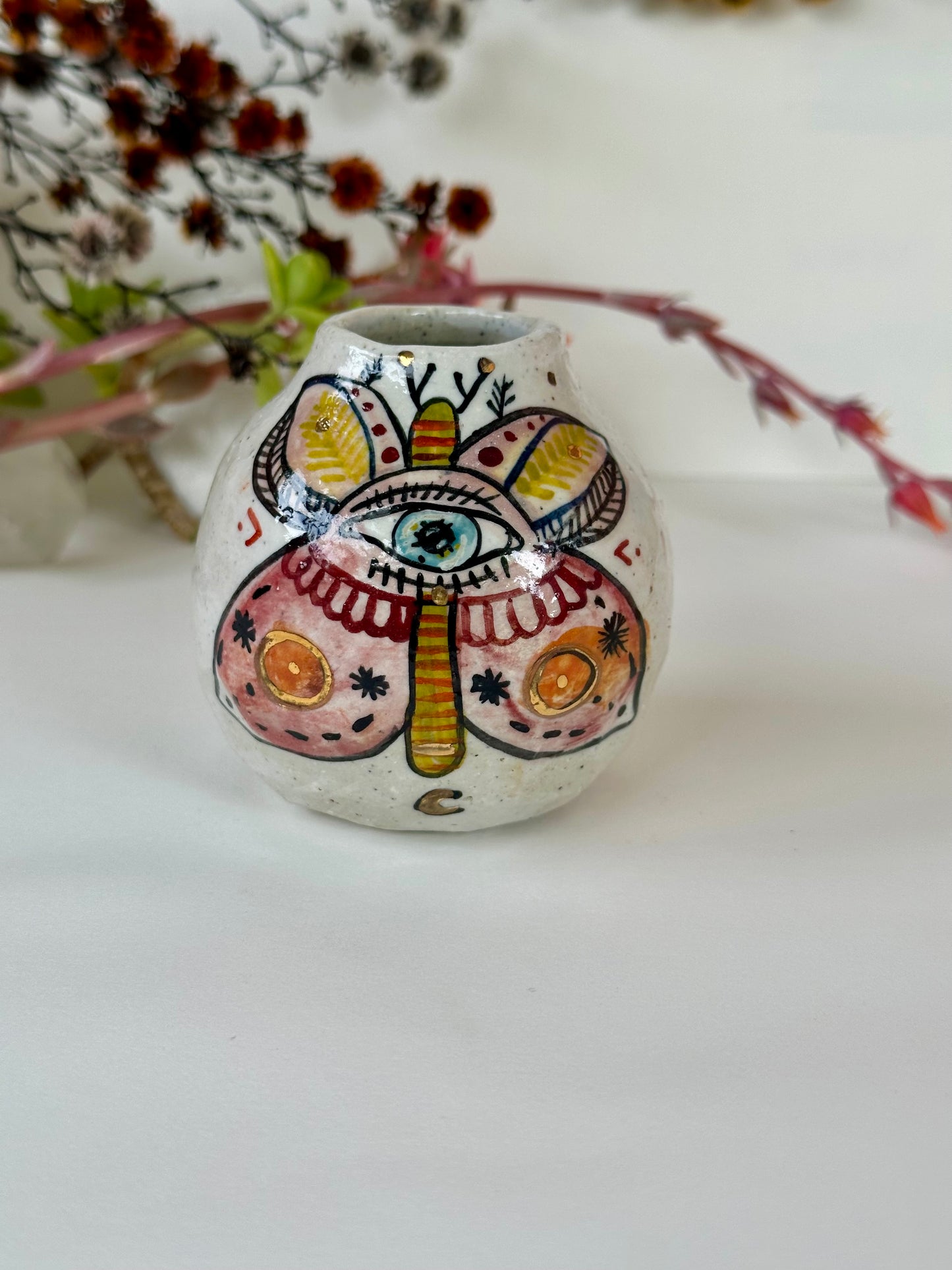 ‘Hand painted ‘the protective eye, moth’ small vase