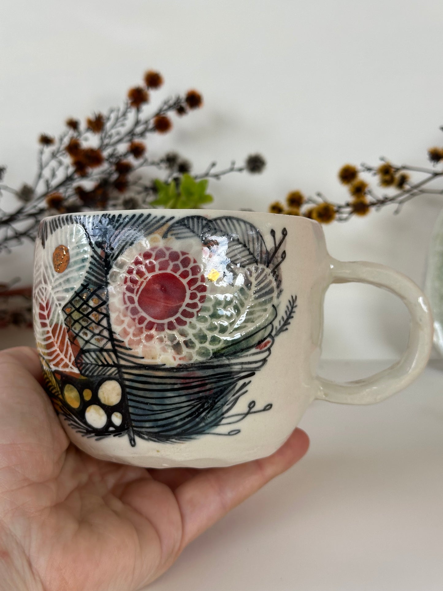 ‘Feather’ hand painted cup