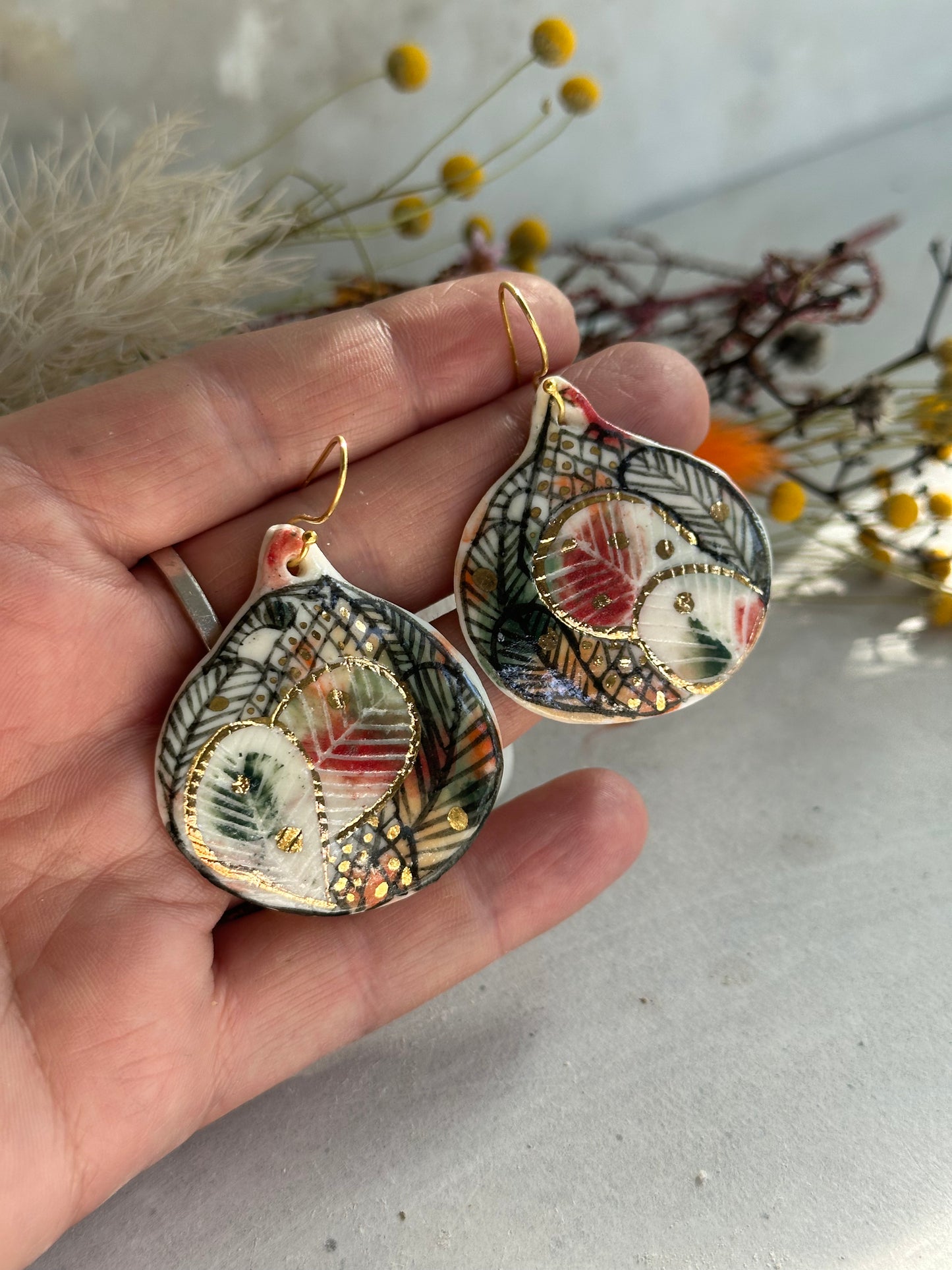 Illustrated porcelain earrings with gold detail