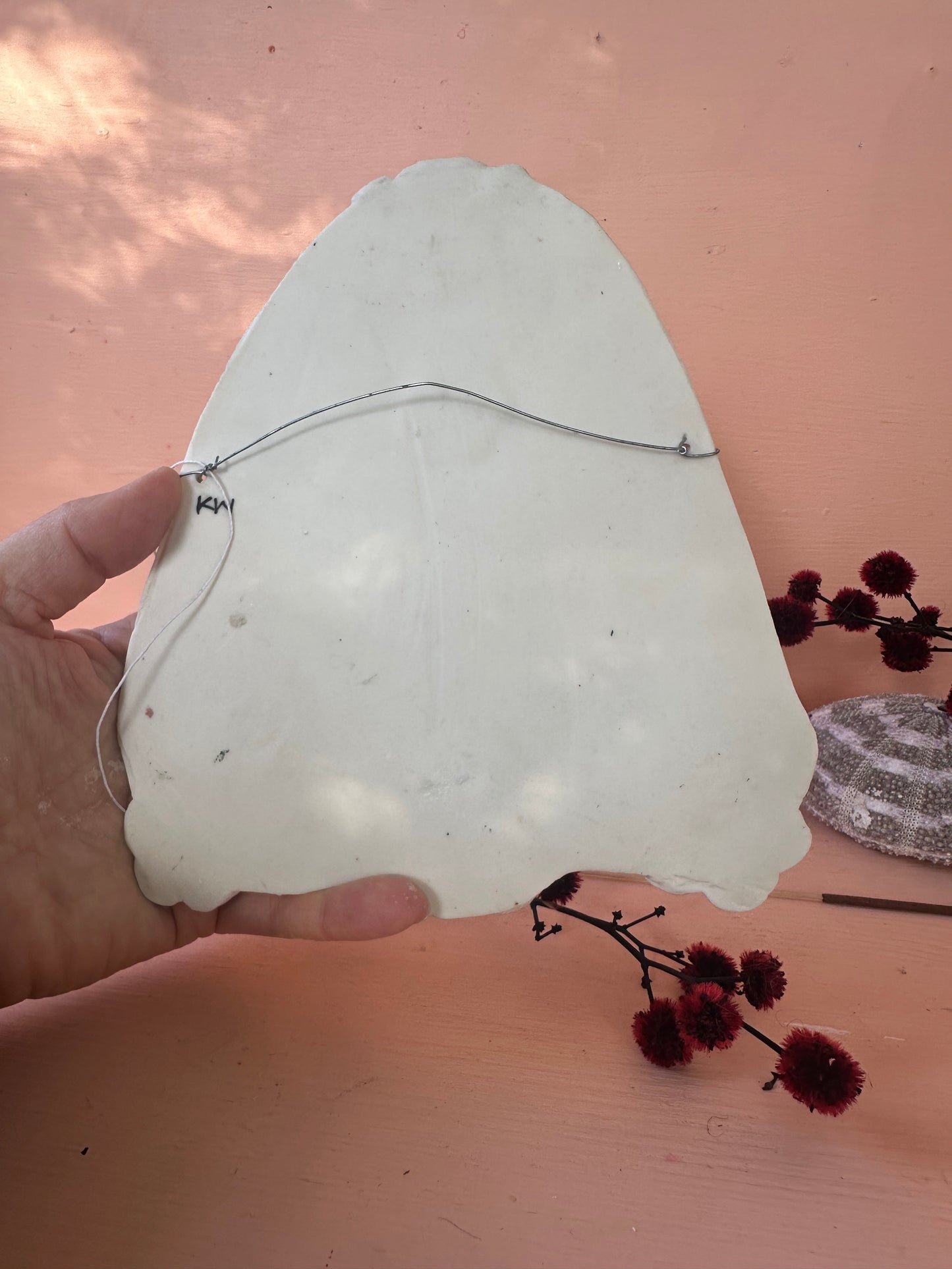 ‘Moth’ porcelain wall piece, with gold lustre detail