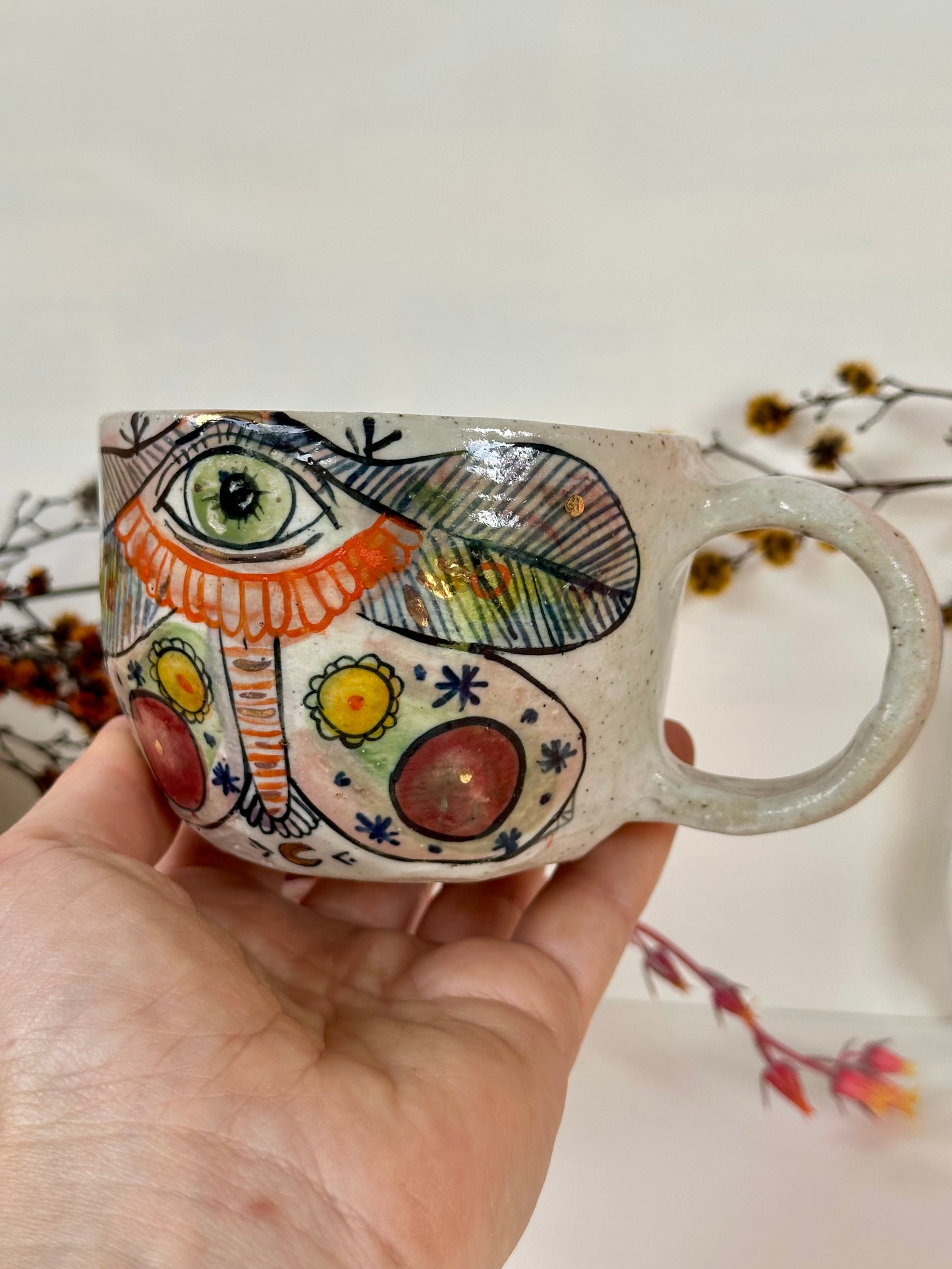 One ‘moth’ hand painted cup