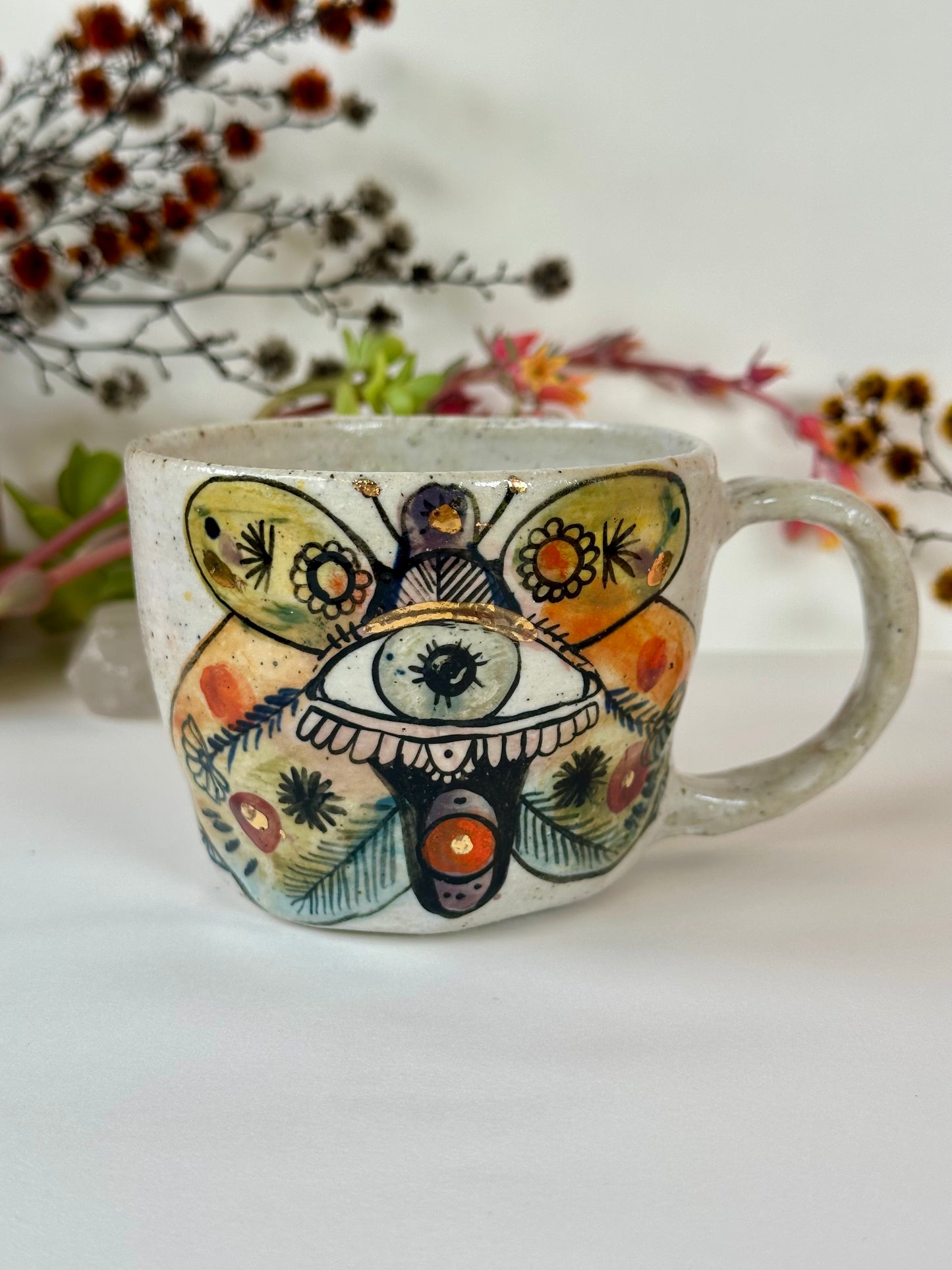 ‘moth’ hand painted cup