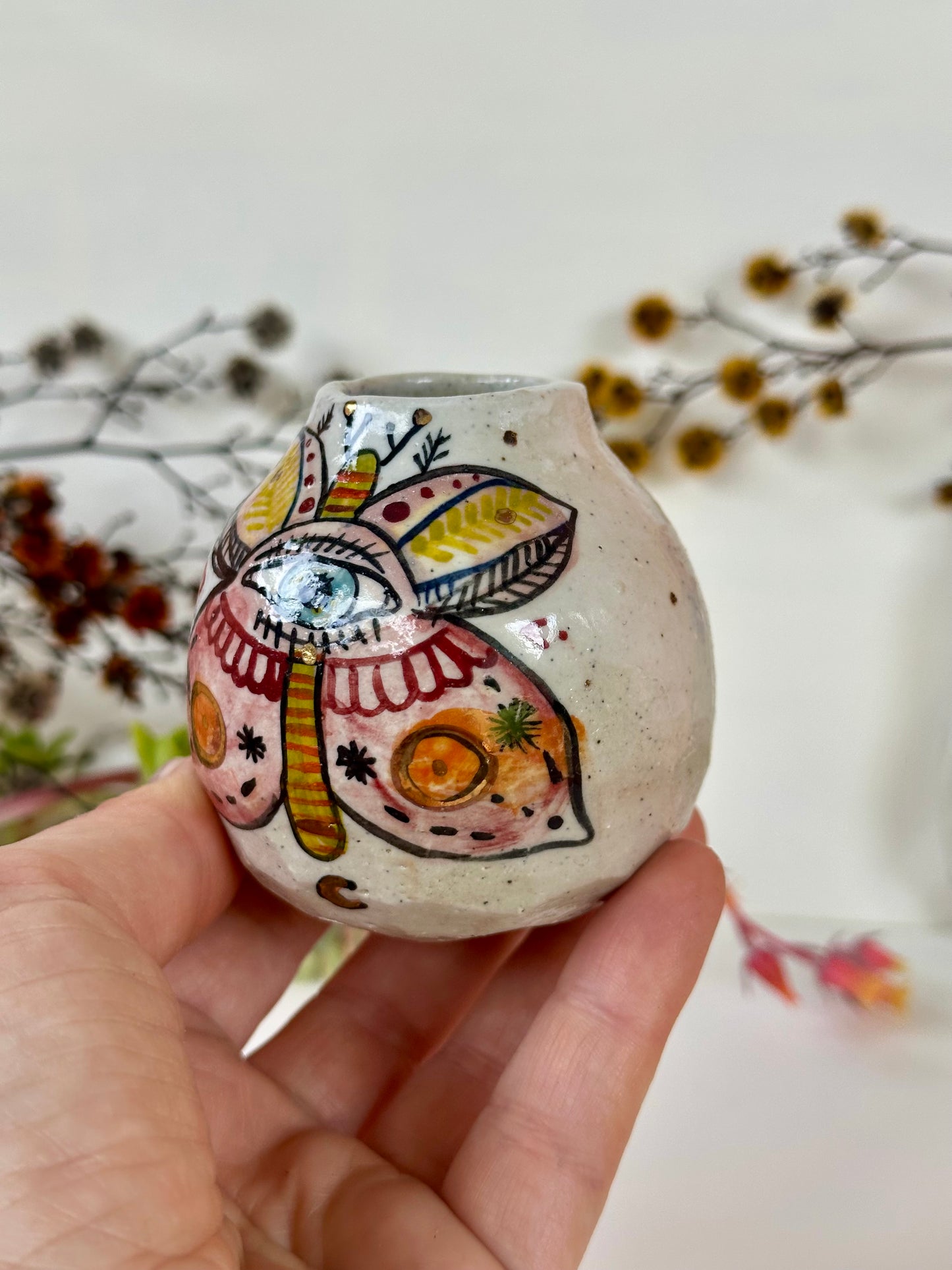 ‘Hand painted ‘the protective eye, moth’ small vase
