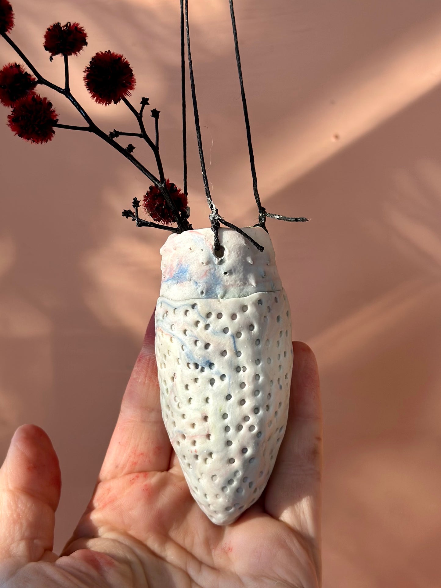 Porcelain hanging pod Vase