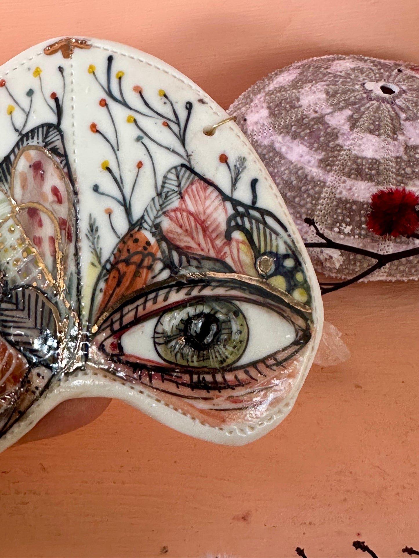 ‘Moth, protective eye’ porcelain wall piece, small gold lustre detail