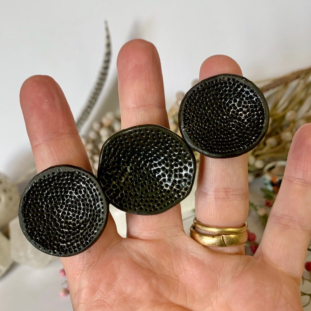 Round black porcelain ‘rock coral’  ring, choose a size