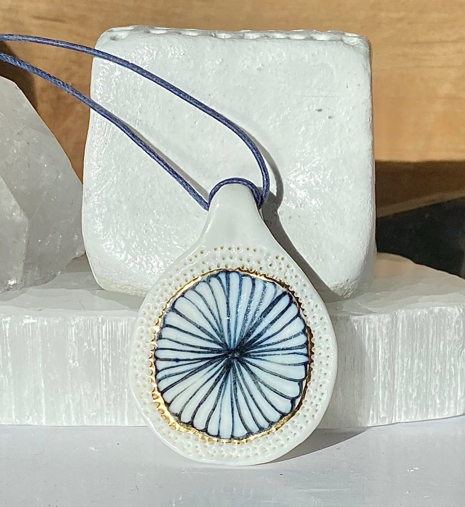 Porcelain indigo flower pendant