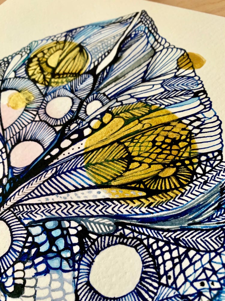 ‘Blue gold leaf’ with hand drawn gold ink details.