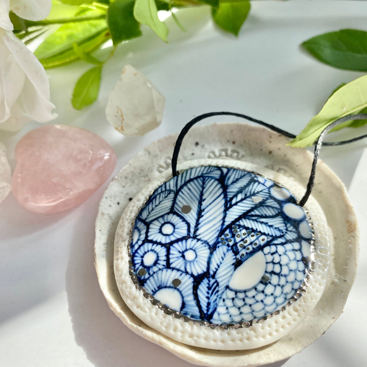 Indigo ‘sea foam’ pendant with silver detail