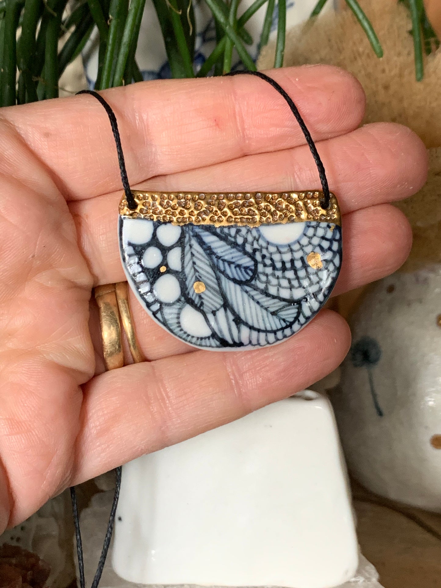 Small Porcelain 'seafoam' illustrated pendant with gold top