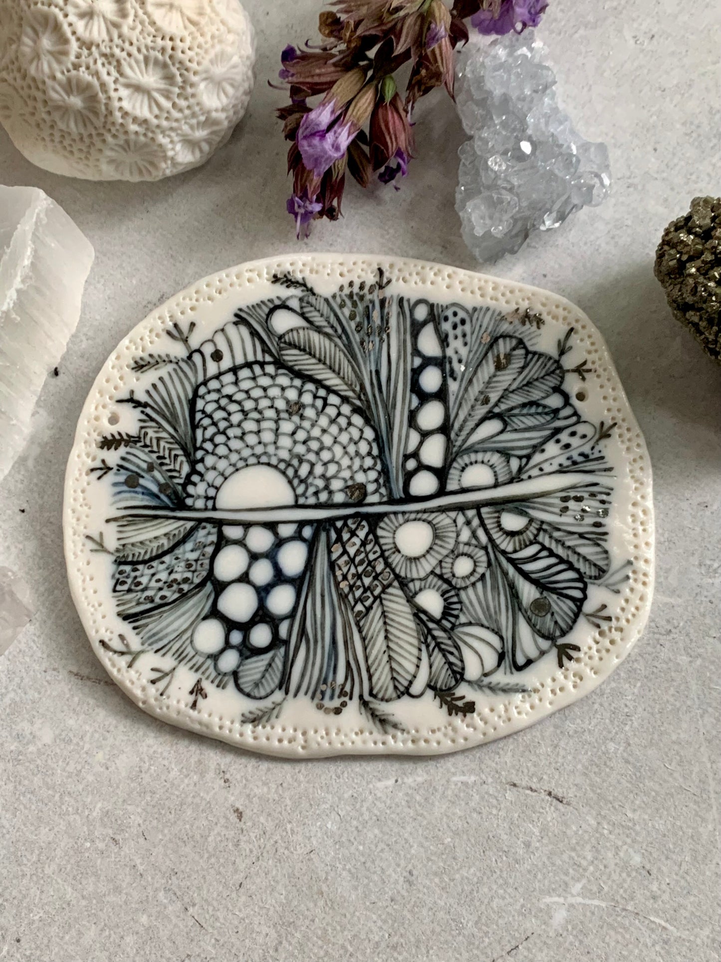 ‘Indigo Seafoam’ small porcelain wall piece, with silver detail