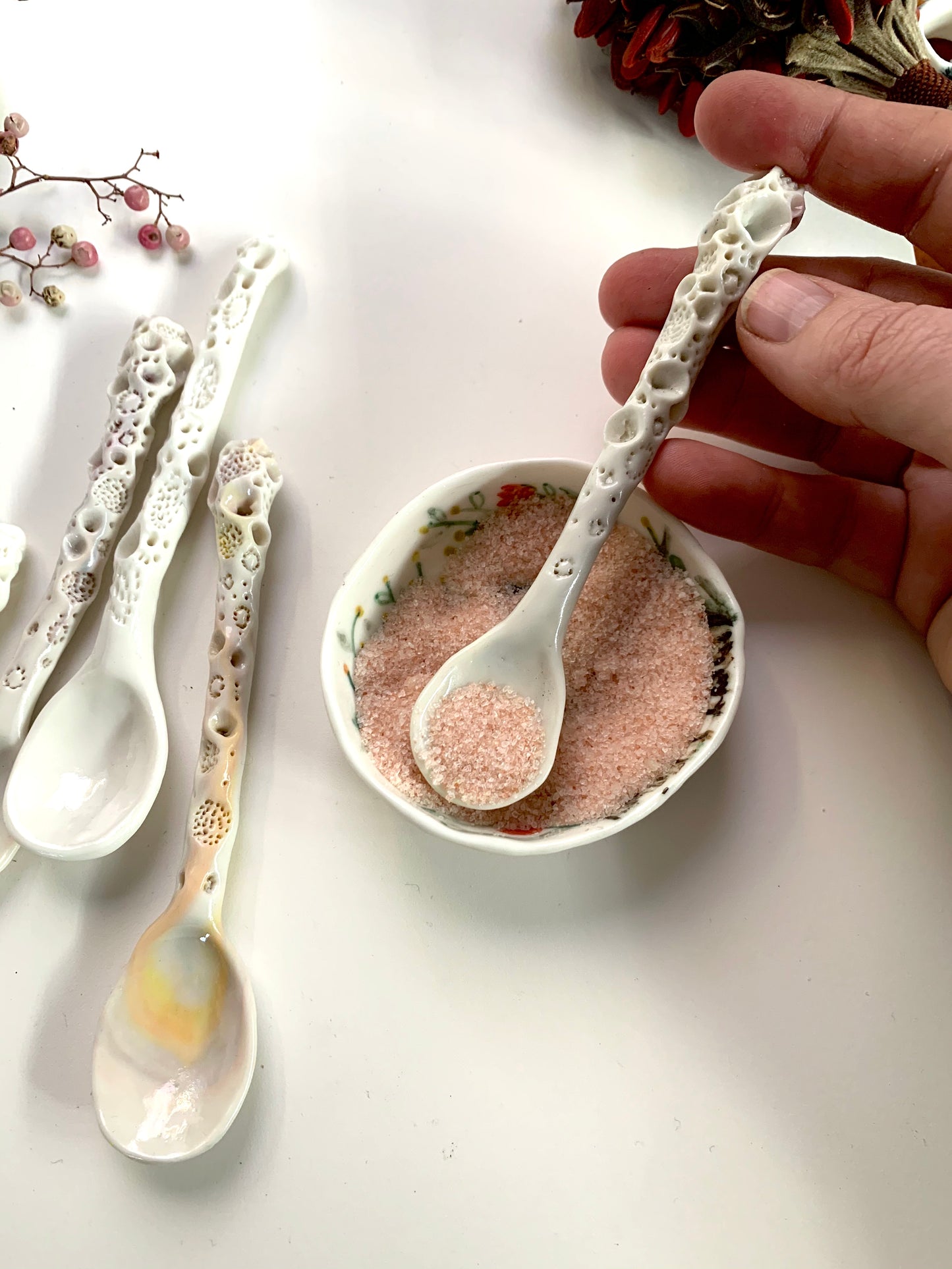 One Porcelain hand formed ‘coral’ spoon