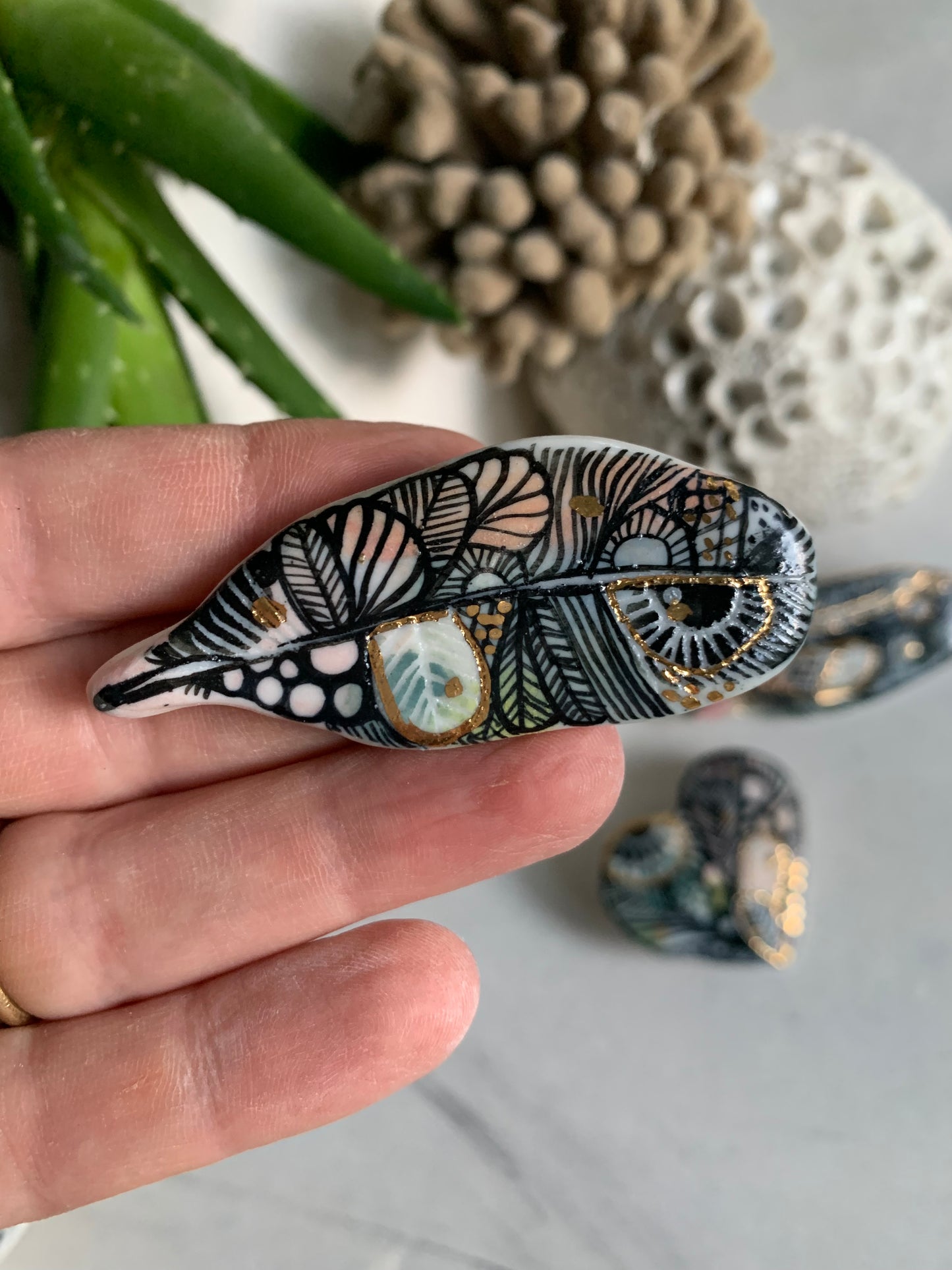 Sgraffito and hand painted ‘feather’ brooch, choose one