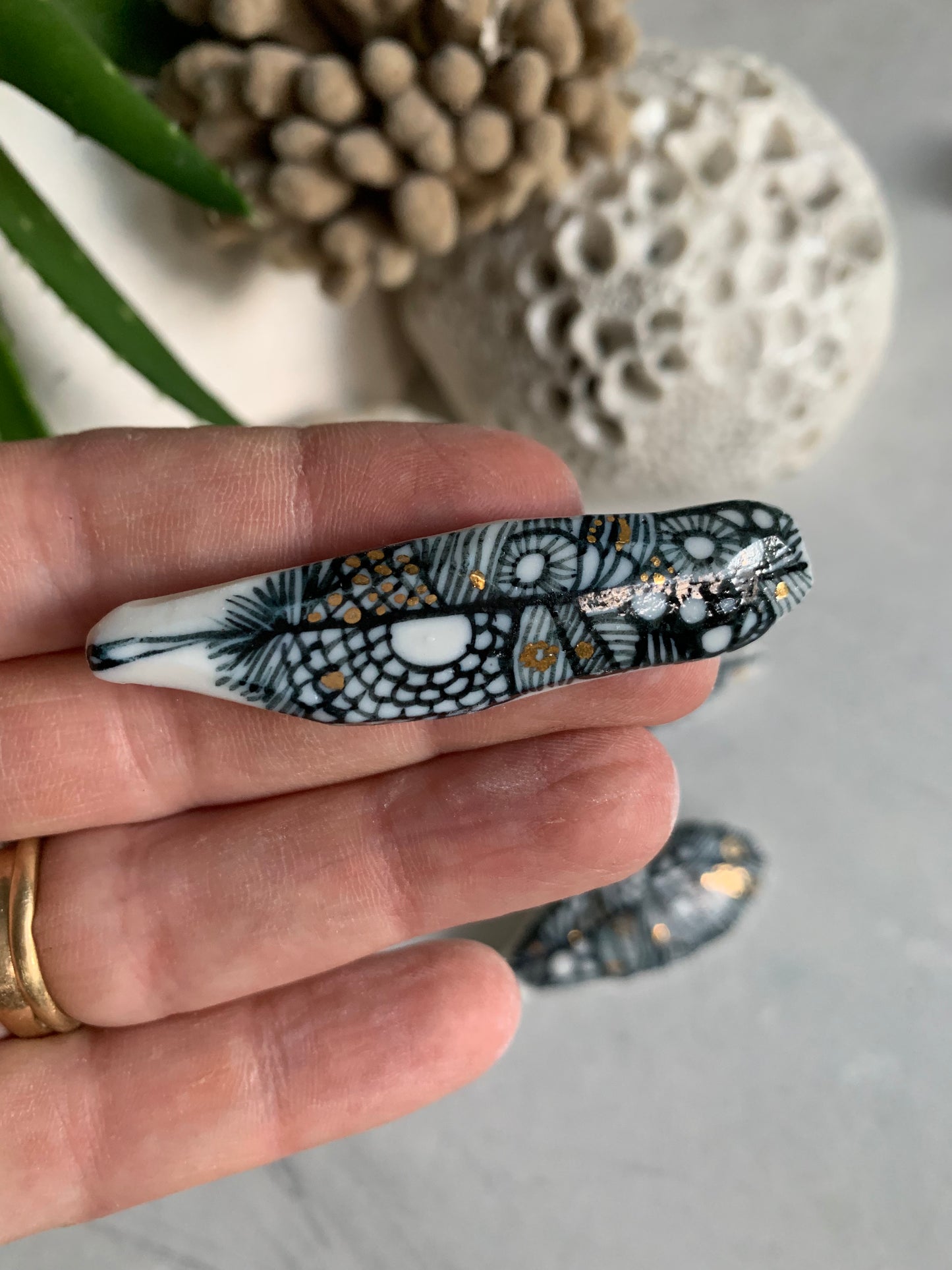 Blue and white hand painted ‘feather’ brooch, choose one